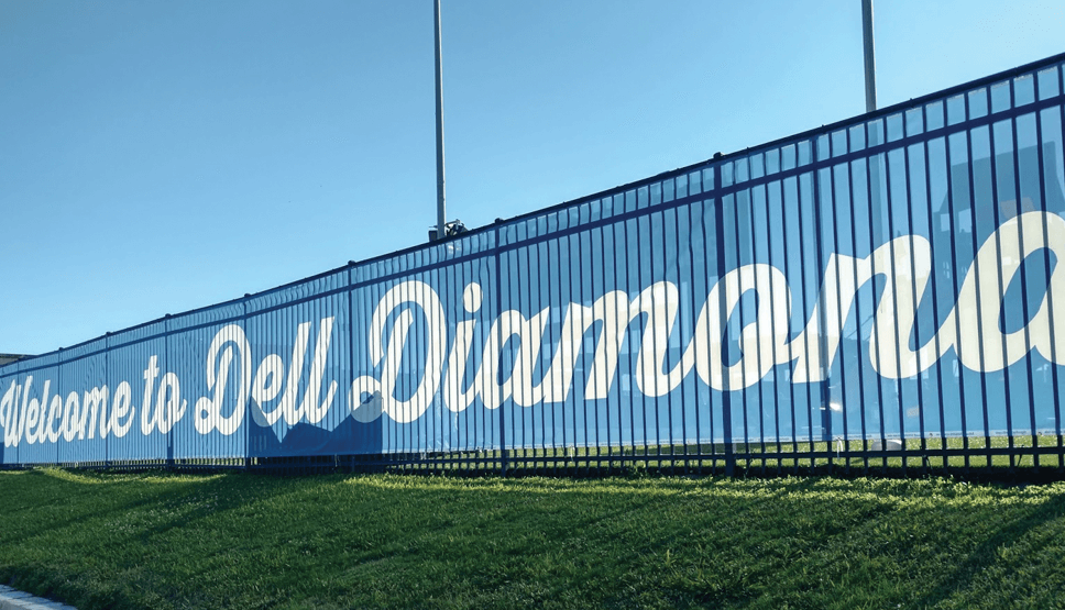 A fence with the words " dell diamond ".
