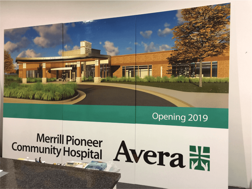 A large sign with the name of merrill pioneer hospital on it.
